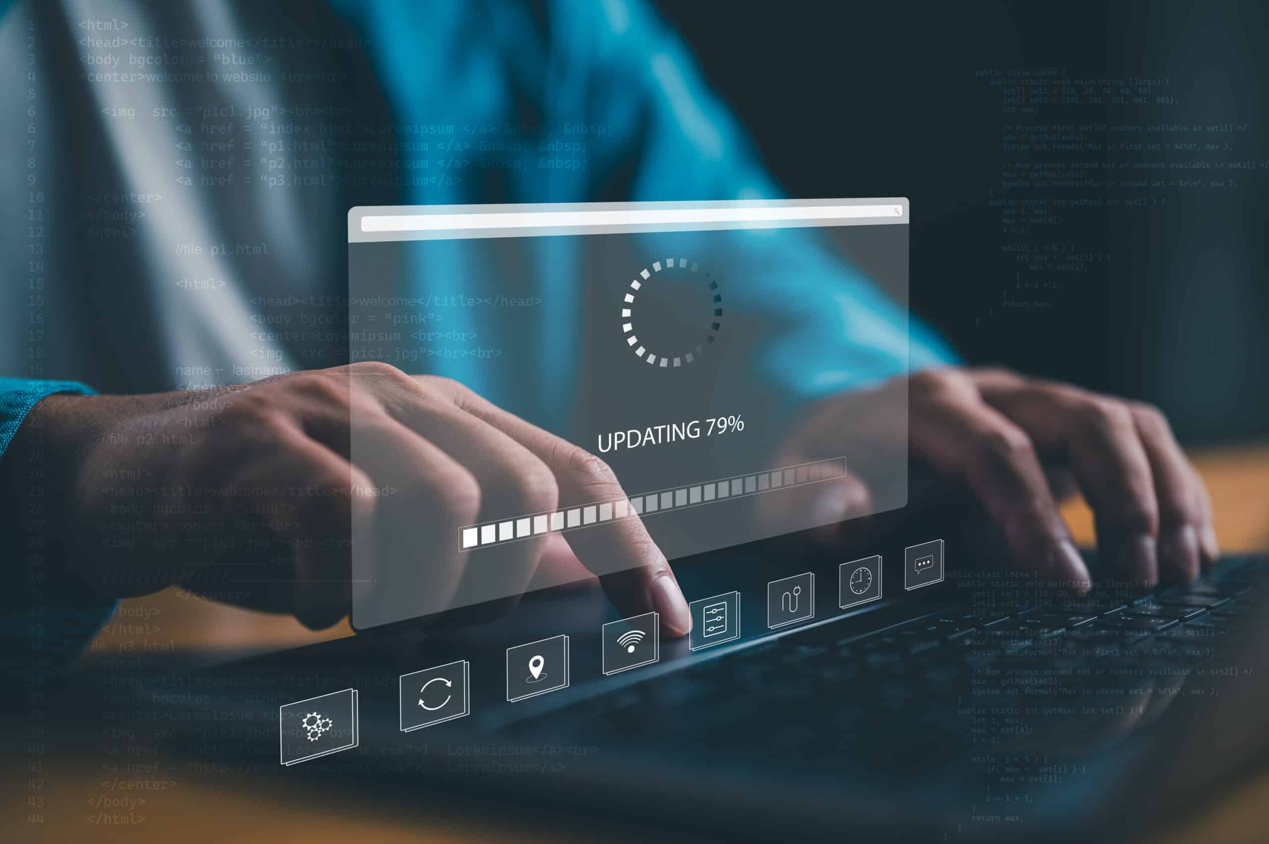 hands typing on a laptop during a software update, with a progress bar at 79%.